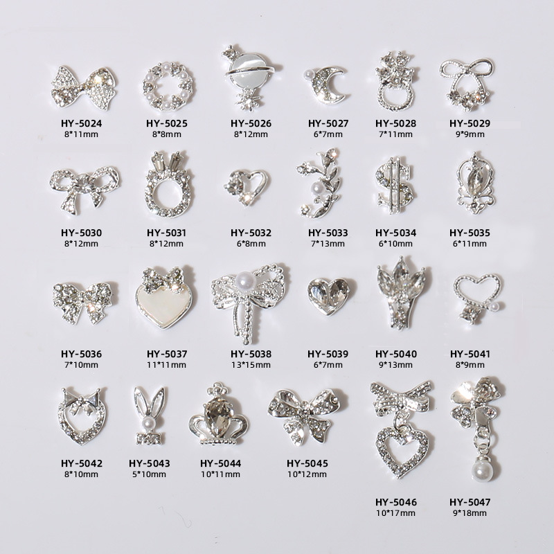 Nuevo arco de uñas amor aleación decoración de uñas flor de la luna mariposa clavo taladro fábrica joyería al por mayor