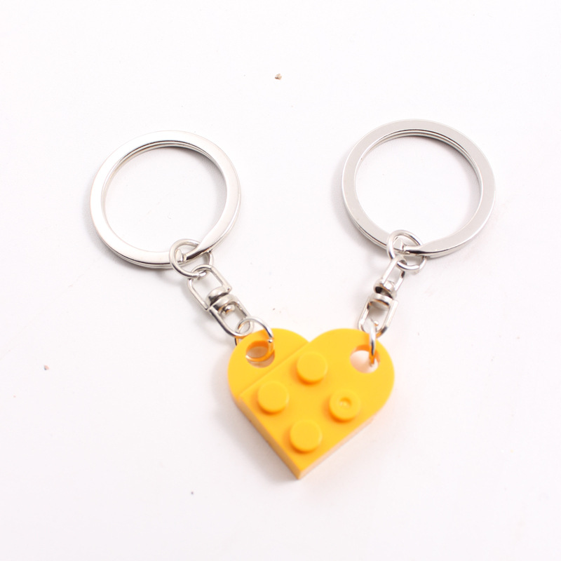 Europa y América Nueva spliced dividir bloques de construcción pareja amor llavero Comercio electrónico transfronterizo Lego rompecabezas llavero