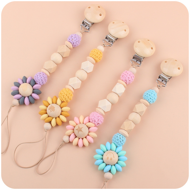 Bebé suministros chupete de madera clip creativo bebé patrón de cuentas de madera de dibujos animados flor chupete cadena Amazon nuevo