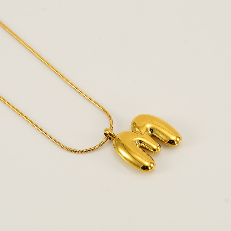 Burbujas transfronterizas 26 letras inglesas colgante brillante collar nicho universal oro acero titanio joyería collar