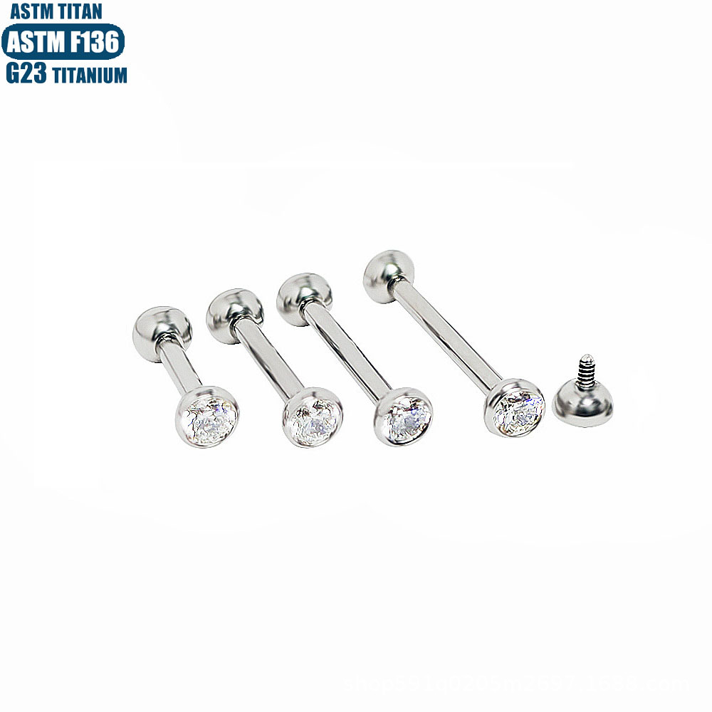 Silver pointed spike labret stud material detail