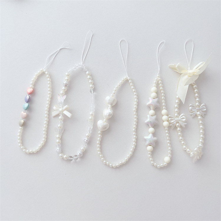 Creamy-white beaded mobile phone chain five-pointed star love bow mobile phone lanyard acrylic phone case pendant wholesale