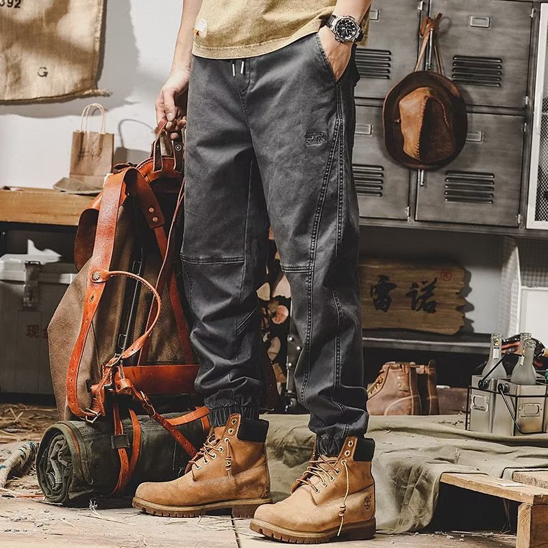 Pantalones casuales para hombres Primavera y otoño Nueva marca de moda coreana suelta más pantalones atados al tobillo pantalones al aire libre con volantes pantalones harén guapos en stock al por mayor