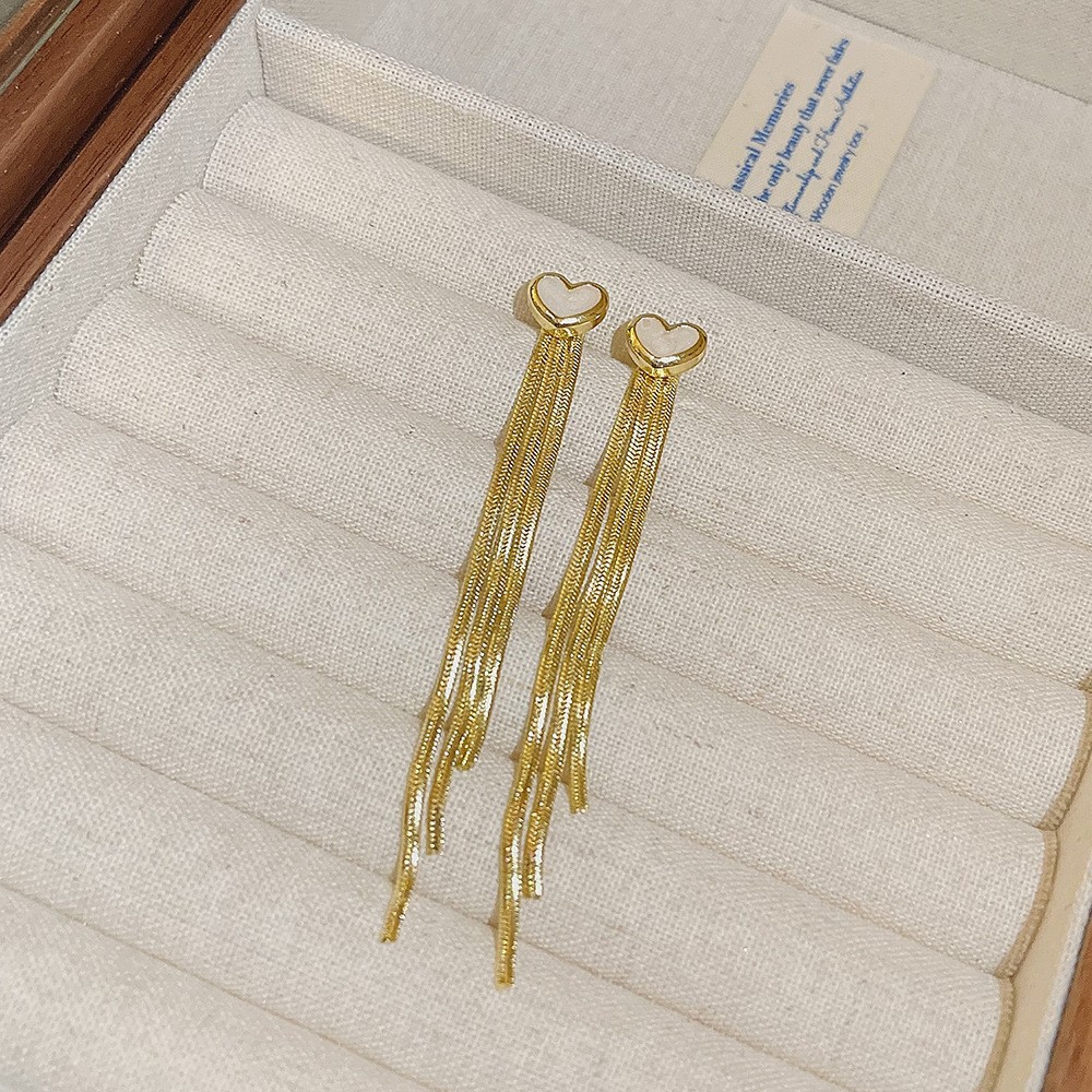 S925 aguja de plata elegante borla pendientes de alta gama simple cara de adelgazamiento pendientes de todo fósforo estilo coreano nuevos pendientes de moda al por mayor