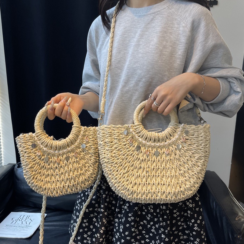 Bolso de vacaciones junto al mar 2025 verano nuevo estilo bolso de hombro de playa tejido de paja bolso de mensajero de gran capacidad mujer