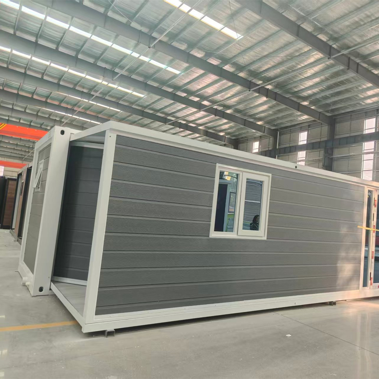 Fábrica al por mayor doble ala expansión plegable temporalmente oficina sitio de construcción puede alojamiento móvil sala integrada rápida