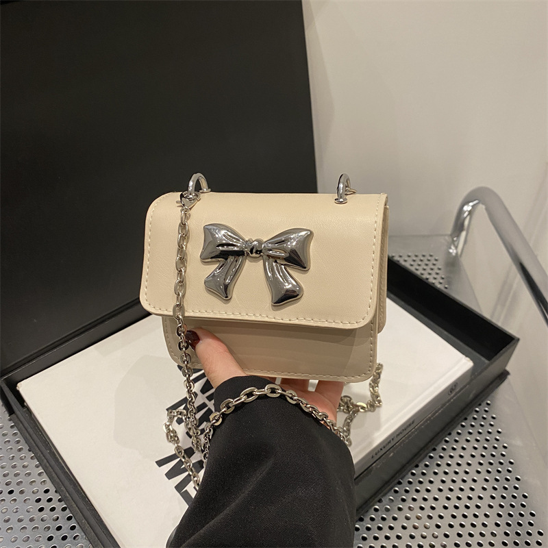 Bolsa de hombro de cadena sólida coreana de textura extranjera simple 2025 verano nuevo mini bolso cuadrado bolso de mujer