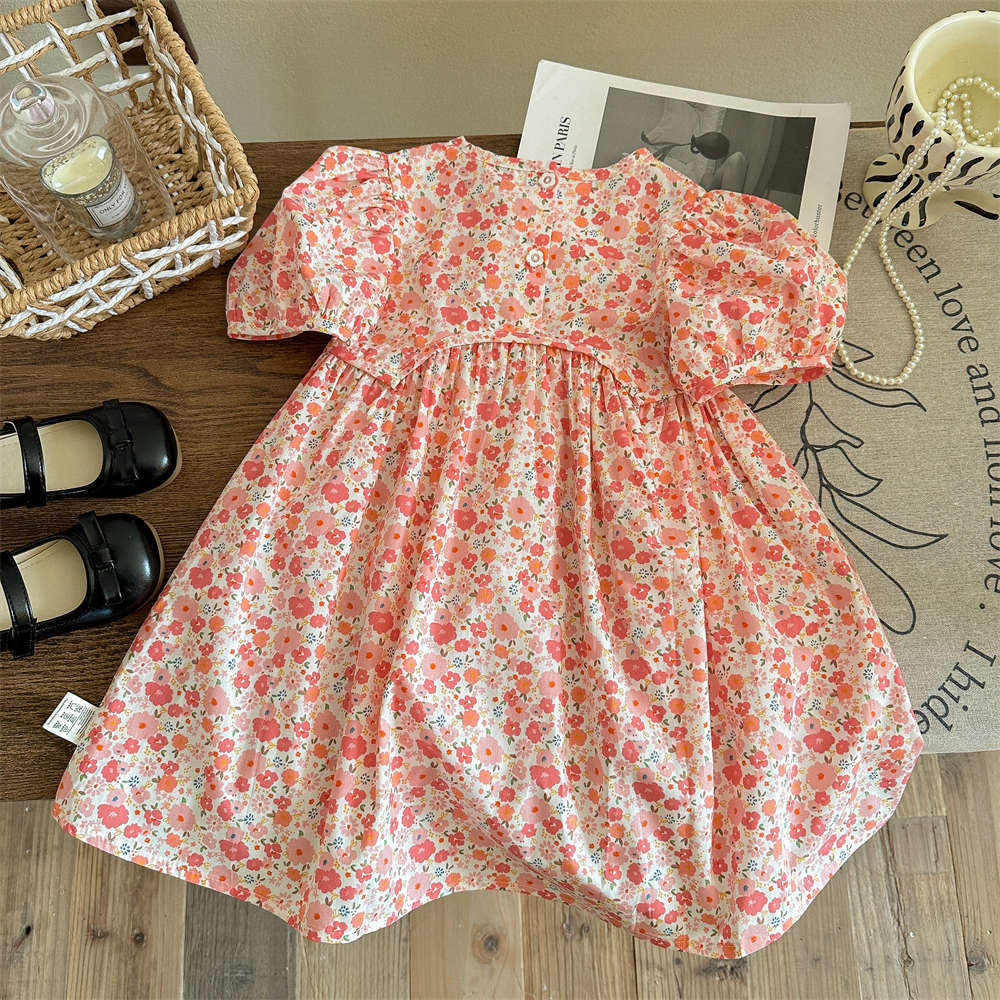 Xianning siete niños coreano vestido floral verano nuevo estilo femenino vestido de princesa estampado de flores de algodón extranjero