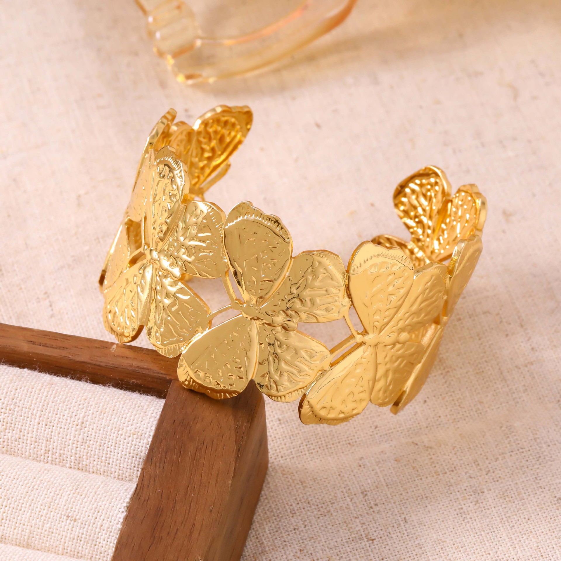 Gold embossed butterfly bracelet