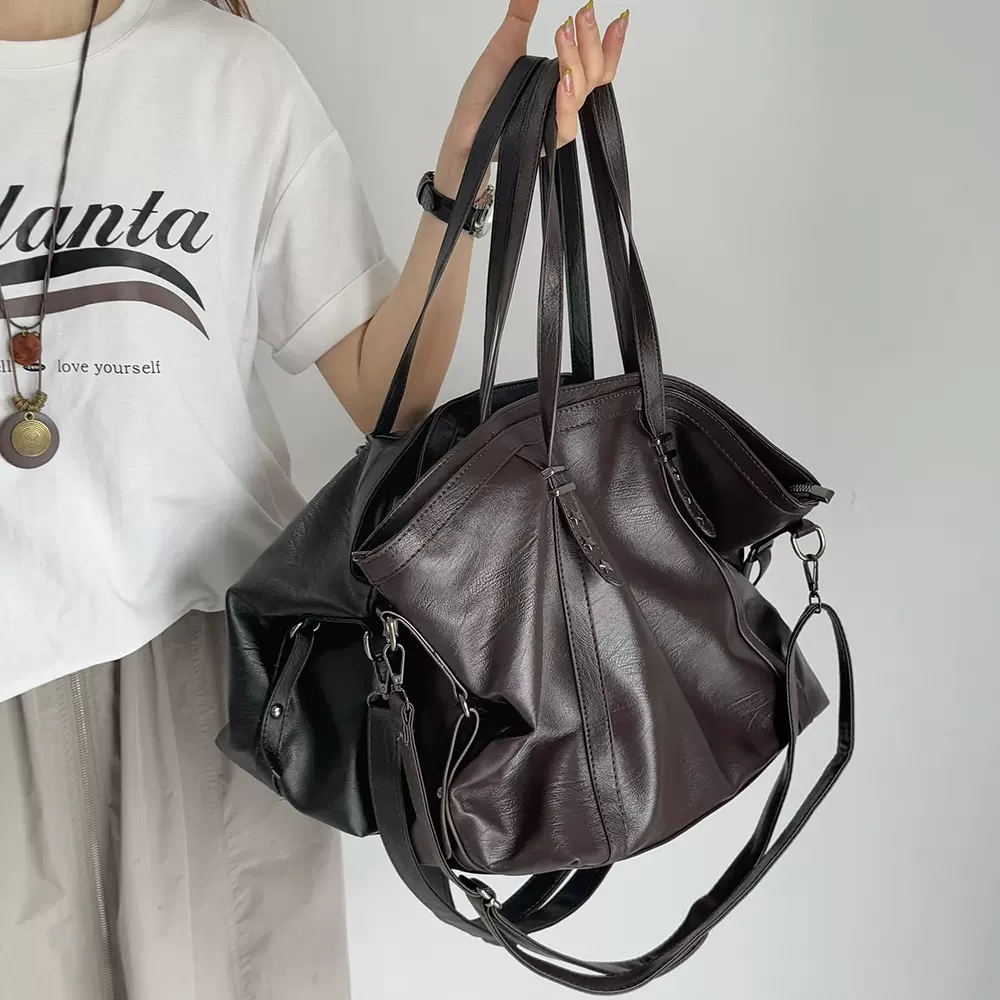 工厂出口百搭单肩托特包大容量单肩欧美复古包质感铆钉斜跨包包女