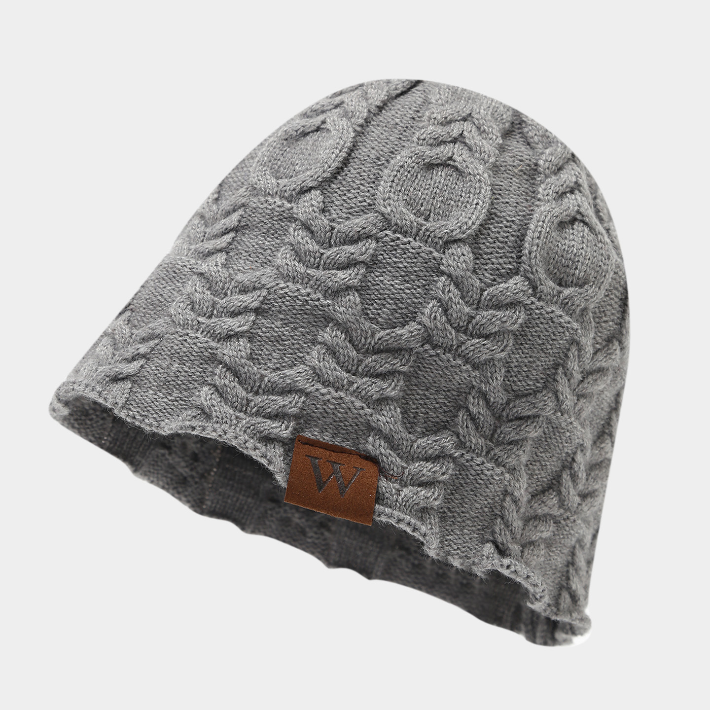 Transfronterizos sombrero de mujer otoño y invierno ocio al aire libre W cuero etiqueta torsión gorra de protector de orejas gorra de punto caliente retro