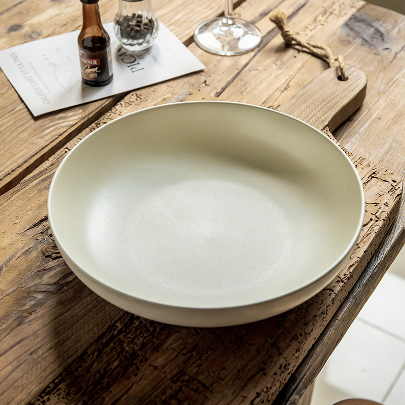 Personalidad simple color sólido profundo platos de cerámica características domésticas de alto valor de color nicho nórdico exportación transfronteriza platos de ensalada