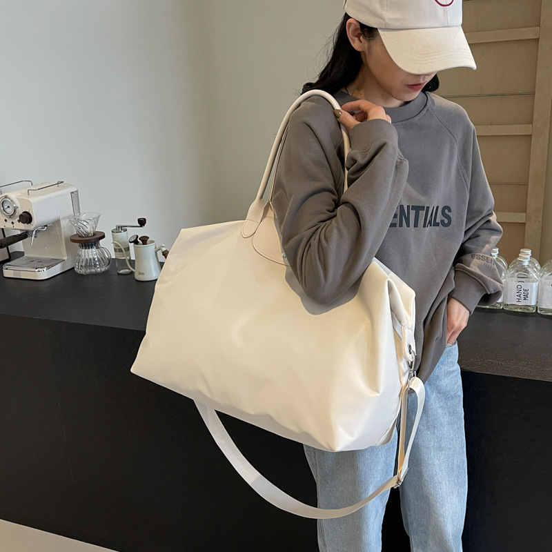Bolso de viaje de viaje de corta distancia, bolso de almacenamiento de fitness de gran capacidad para mujer, bolso de yoga de entrenamiento simple y versátil, bolso de hombro al por mayor
