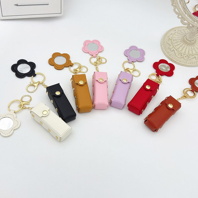 Flor pequeño espejo llavero creativo transfronterizo portátil mini cuero sobre rojo spot llavero bolso colgante