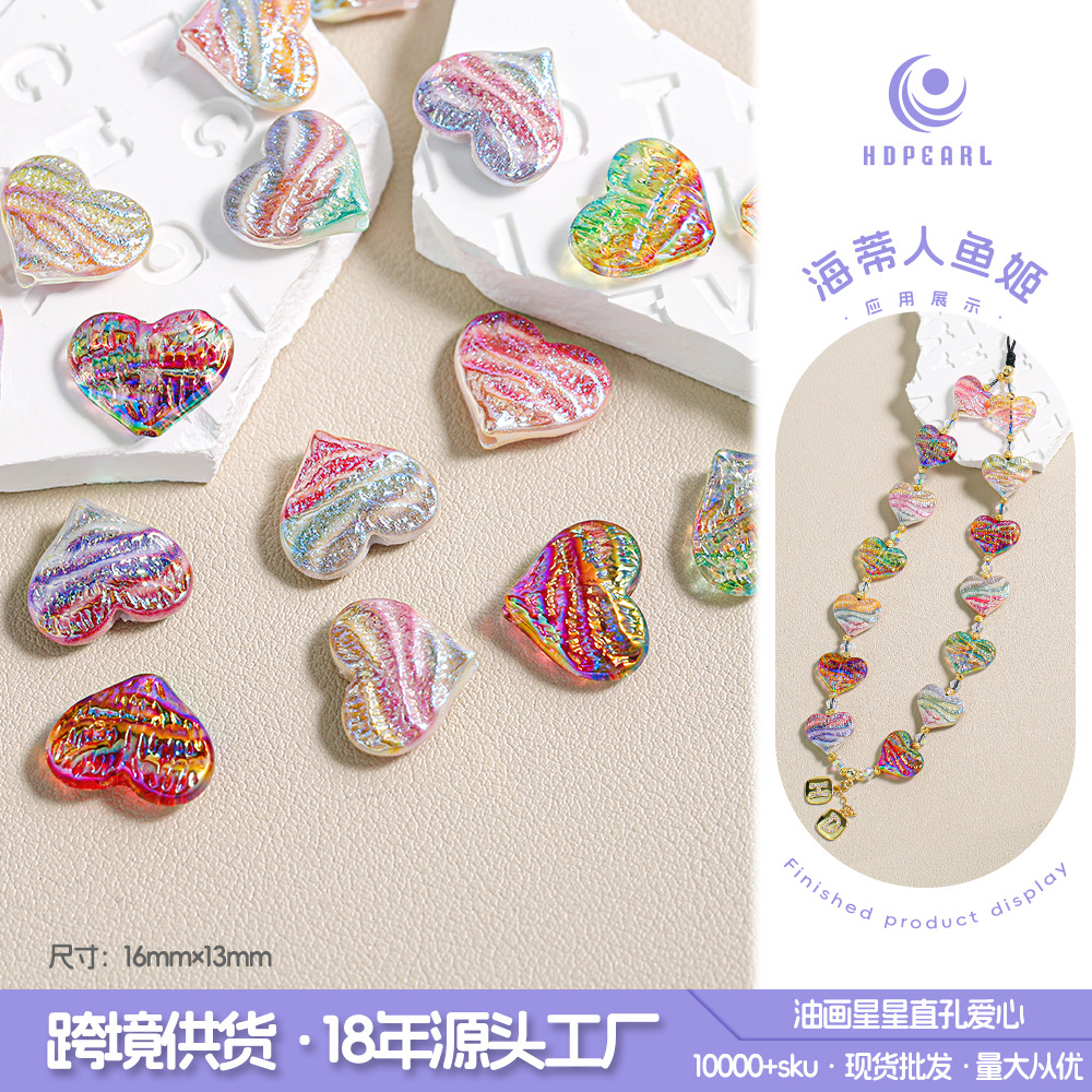 Pintura al óleo de Heidi amor a través de agujeros de cuentas dispersas en forma de corazón pulsera galvanizada accesorios de cadena de teléfonos móviles al por mayor