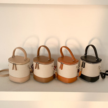 韩国帆布斜挎水桶包女士通勤小众設計百搭时尚高级感拼接手提包包