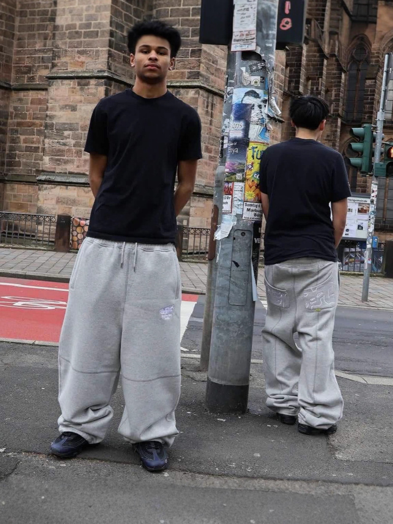 2025 marca de moda europea y americana transfronteriza estilo americano retro calle casual todos los días pantalones sueltos bordados gris hombres y mujeres