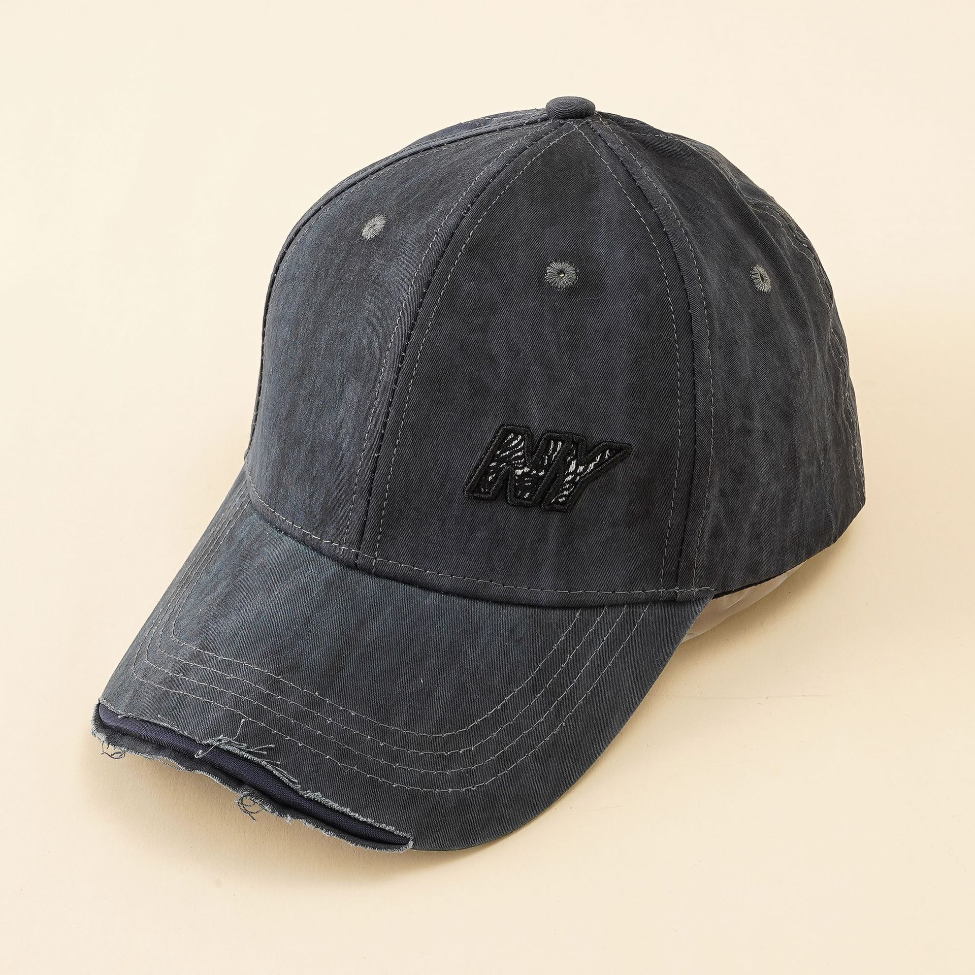 Gorra de hombre y mujer primavera y verano estilo coreano bordado letra agujero gorra de béisbol a prueba de sol hombres y mujeres hip hop Retro