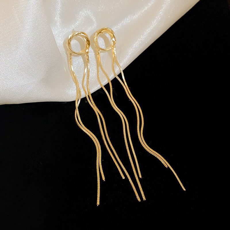 Pendientes de borla de hoja de circón largo de viento de metal con aguja de plata Pendientes de moda exquisita Pendientes de lujo ligero de viento frío