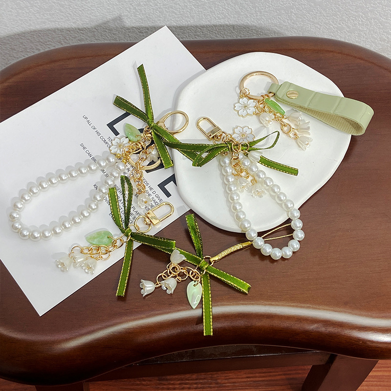 New Green Ribbon Car Key Chain Pendant Creative Lily Pearl Chain Pendant Headphone Cover Bag Decoration New Green Ribbon Car Key Chain Pendant Creative Lily Pearl Chain Pendant Headphone Cover Bag Decoration