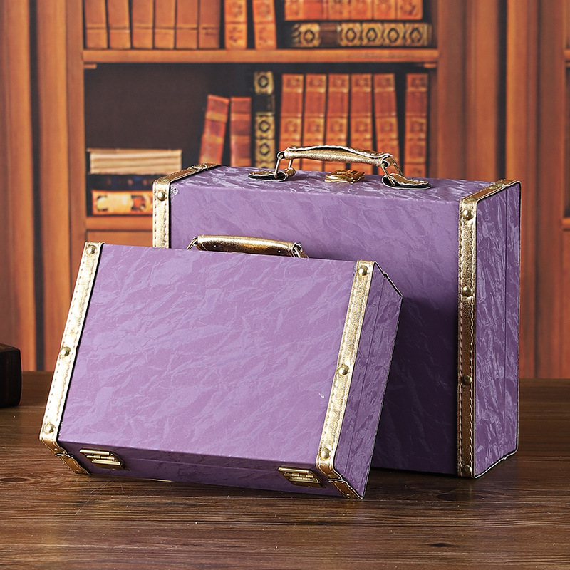 Handheld capacious storage box for traveling