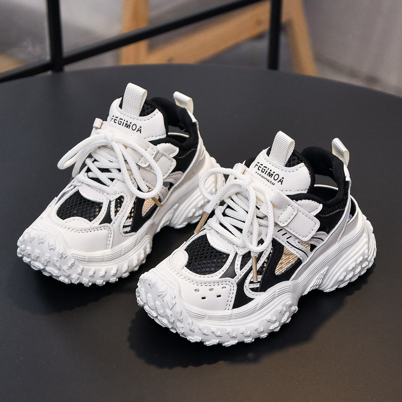 Sandalias para niñas 2025 nuevo verano Baotou zapatos de red ligeros para niños transpirables zapatos con marco deportivo de suela blanda para niños