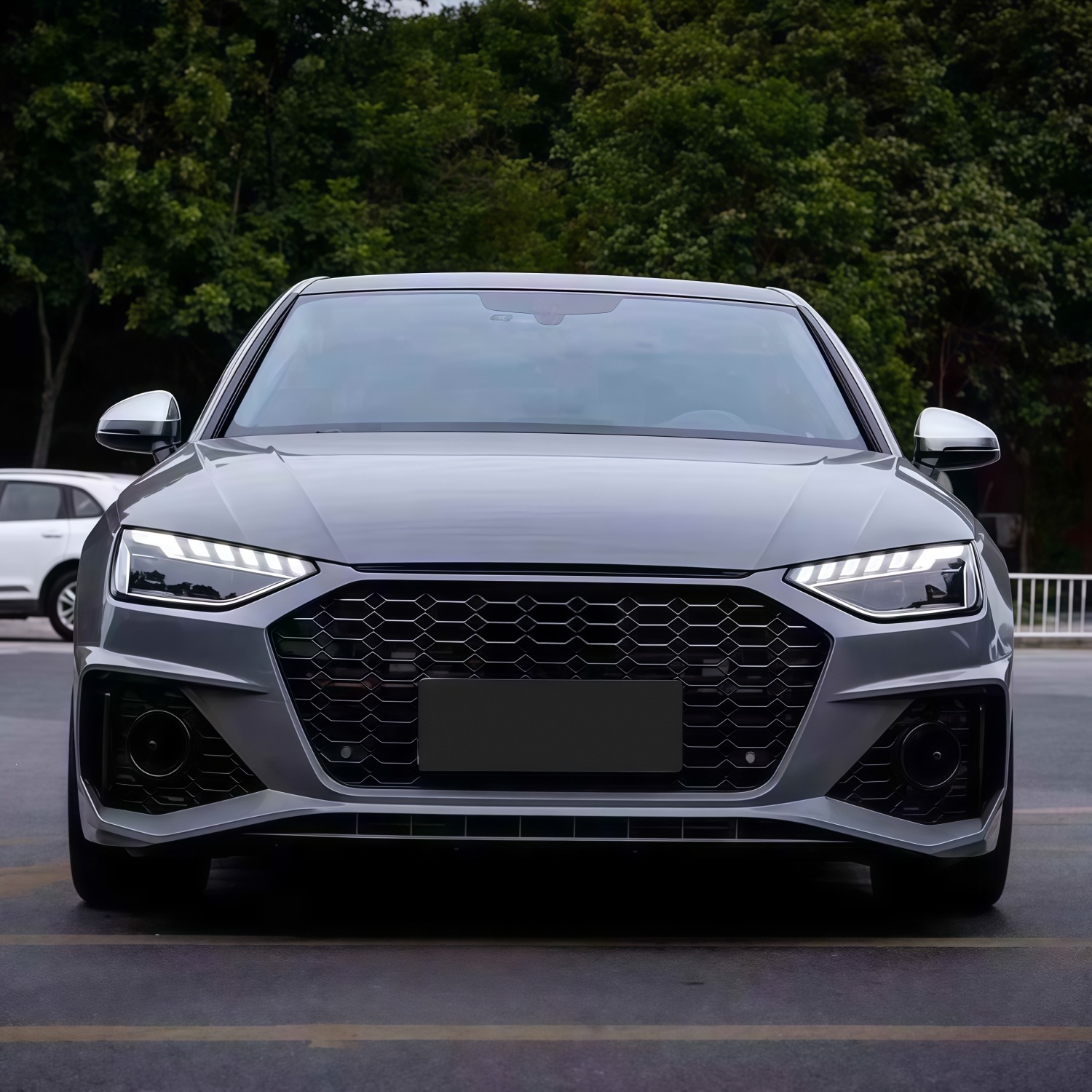 20-22 models suitable for Audi A4L, modified with an RS4-style front bumper, front grille, and front fascia