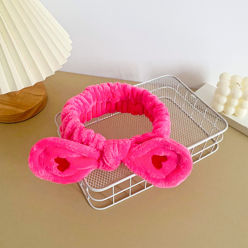 Celebridad en línea estilo coreano bordado pequeño corazón arco banda para el cabello deportes de las mujeres yoga pañuelo cara lavado banda para el cabello accesorios para el cabello al por mayor
