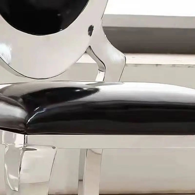 Sillas de comedor de acero inoxidable personalizadas lujo ligero de alta sensación de mesa de comedor silla transfronteriza silla dorada en el Medio Oriente