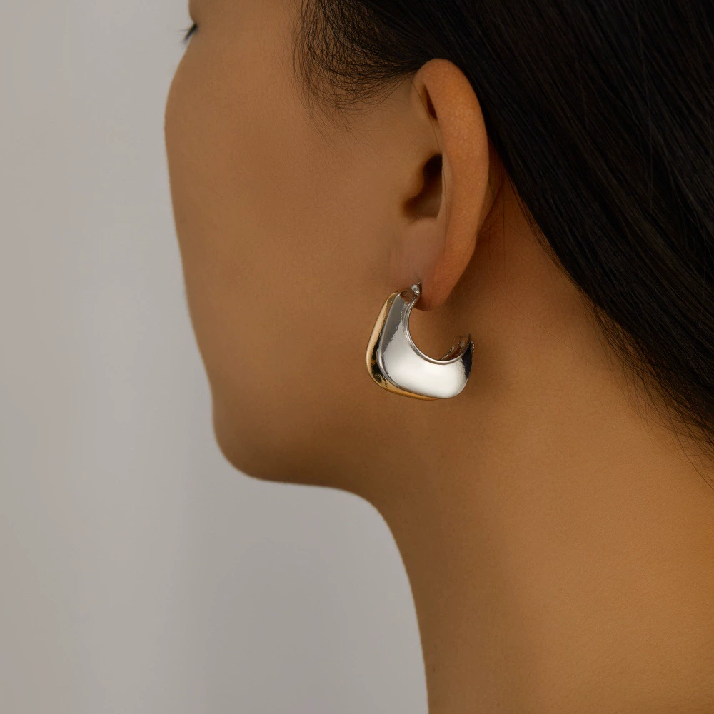 Европейские и американские трансграничные ювелирные изделия, двухцветные гальванические асимметричные серьги из сплава, модные нишевые геометрические серьги, прямая продажа с фабрики