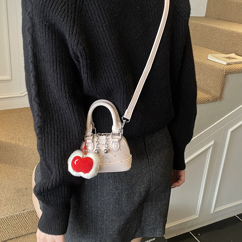 Bolsas coreanas para niños y niñas, bolsas de conchas, bolsas de mano de manzana, bolsas para niños, bolsas de comercio exterior transfronterizas 2026