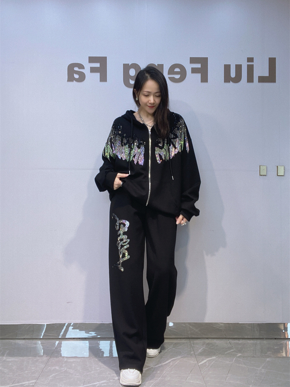 Transfronterizos de ropa de mujer de otoño y invierno de dos piezas casuales con cremallera chaqueta con capuzas chaqueta chaqueta de taladro caliente pantalones rectos grandes para mujeres