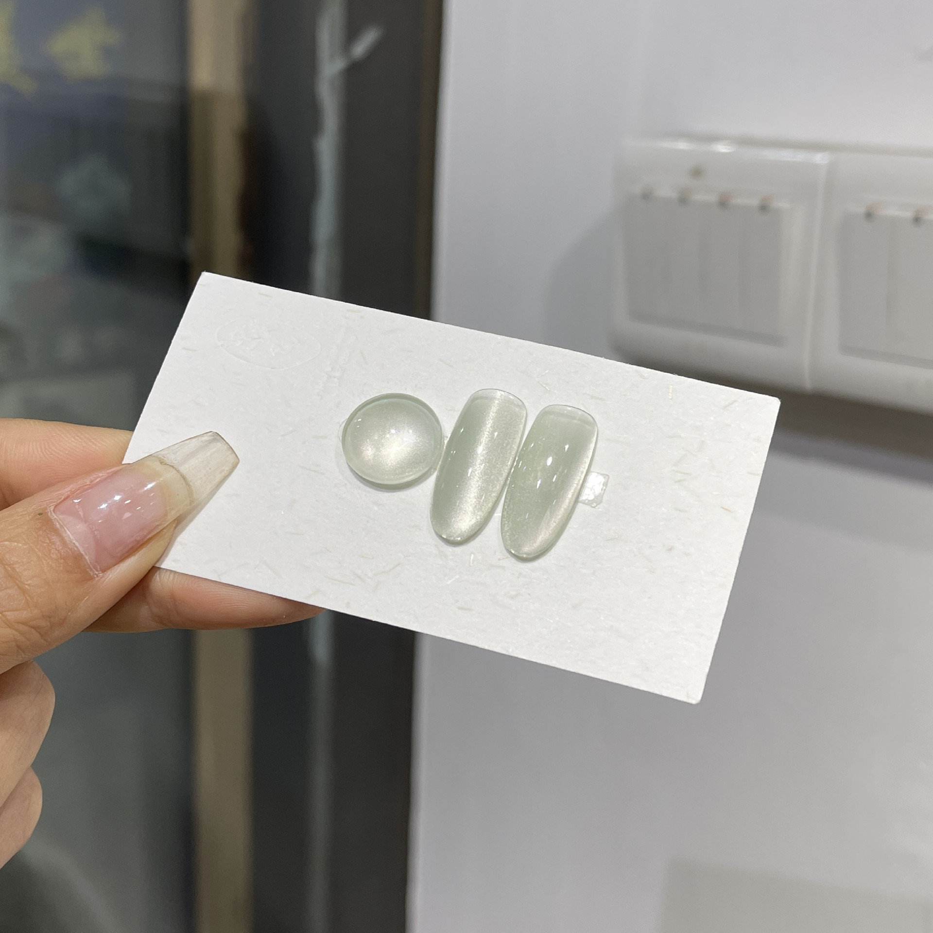 Venta caliente transfronteriza pegamento para ojos de gato rojo hielo arte de uñas celebridades de Internet caliente tienda de uñas de uso común pegamento de esmalte de uñas de ojo de gato de cristal popular