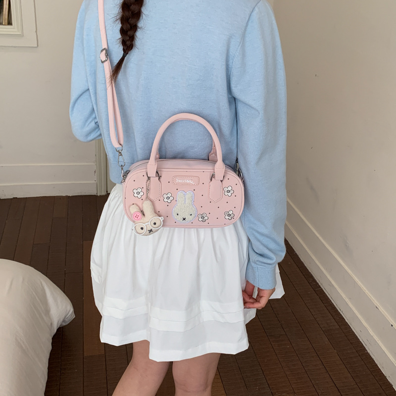 Dolce flor pequeña bolsa de Boston para mujeres 2026 nuevo bolso de mochila portátil bolso de almohada diario bolso de viaje de moda