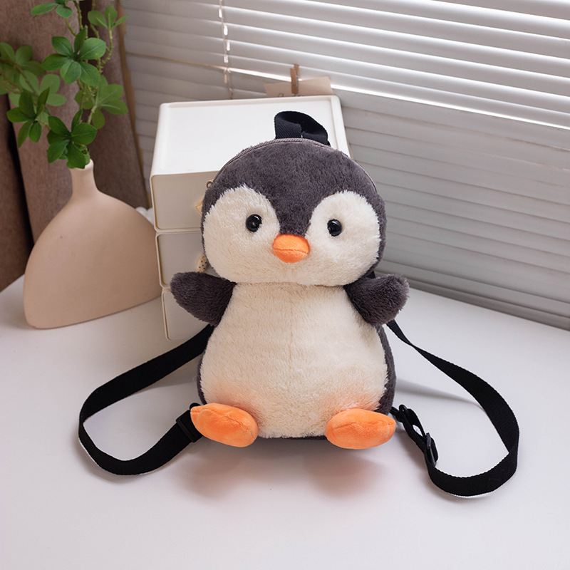 Bonitos pingüinos juguetes de peluche bufandas de invierno muñecas de dibujos animados niños mochilas agarrar muñecas al por mayor muñecas noreste