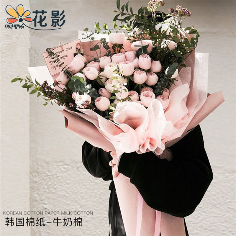 Venta al por mayor de Corea nueva tecnología negro algodón papel enrollado material FORRO impermeable leche algodón actualizado flor material de embalaje