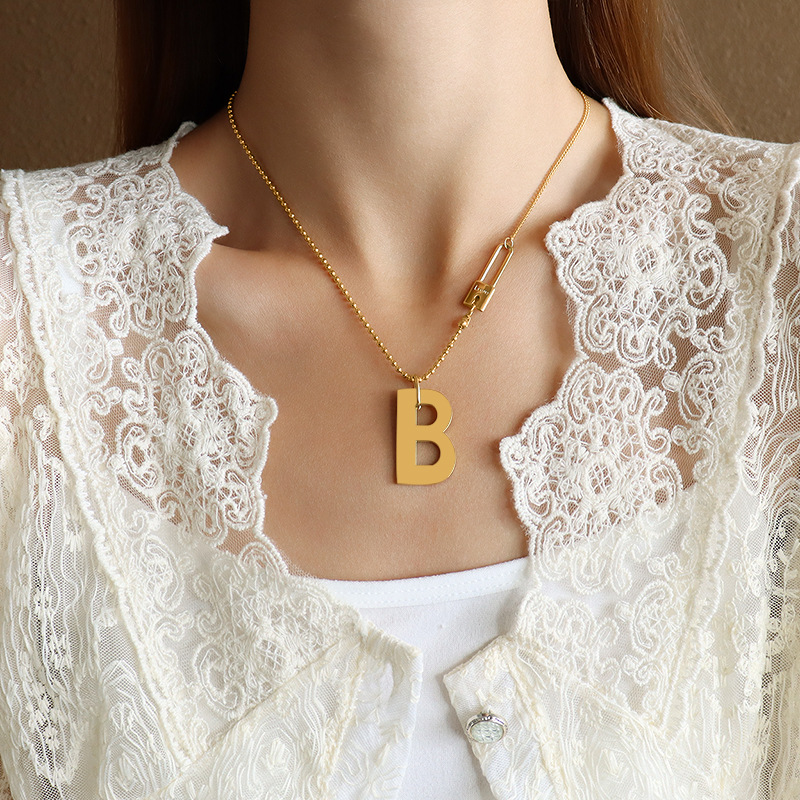 ins cold wind exaggerated letter B stitching pin lock necklace titanium steel plated real gold letter clavicle chain_voghion.com