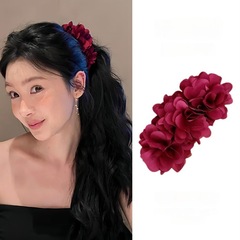 易夢玲は同じタイプのシミュレーション花の花の超巨大なバナナを挟んで森系の盤の髪の低い馬尾の髪を挟んで優しいです。