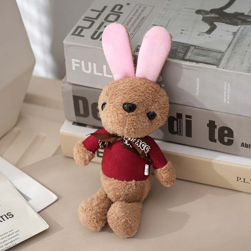 卸売20cm熊のぬいぐるみのリュックサックの服はぬいぐるみを飾って子供を捕まえます。|undefined