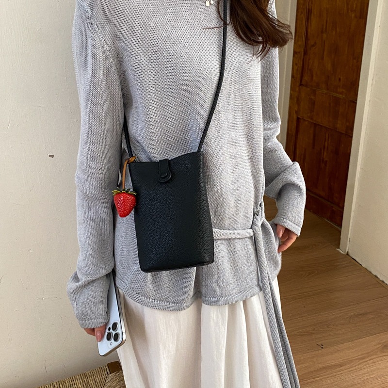 Nuevo mochila ligero verano 2026 teléfono móvil cuero suave versátil cubo de transporte mini mochila de hombro mujer estilo coreano