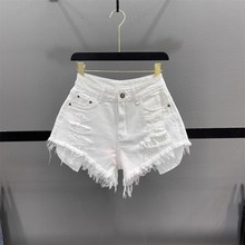 白色时髦乞丐破洞牛仔短裤女2025夏高腰显瘦辣妹A字毛边阔腿热裤