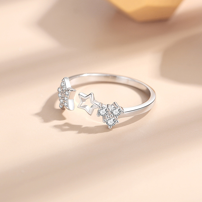 Anillo de plata 925 estilo coreano ins estilo estrella incrustada en diamantes anillo de mujer abierto nicho estilo de lujo ligero estrella de cinco puntas anillo al por mayor