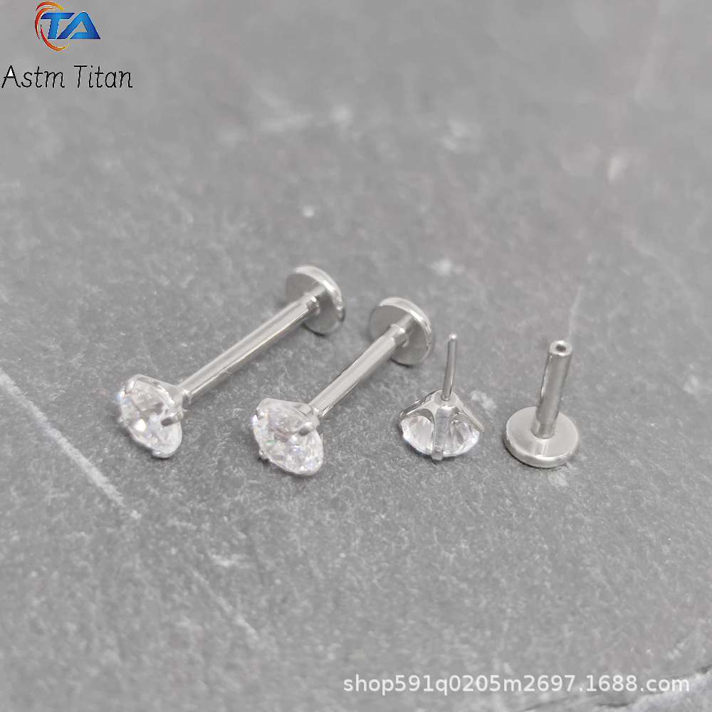Silver pointed spike labret stud material detail