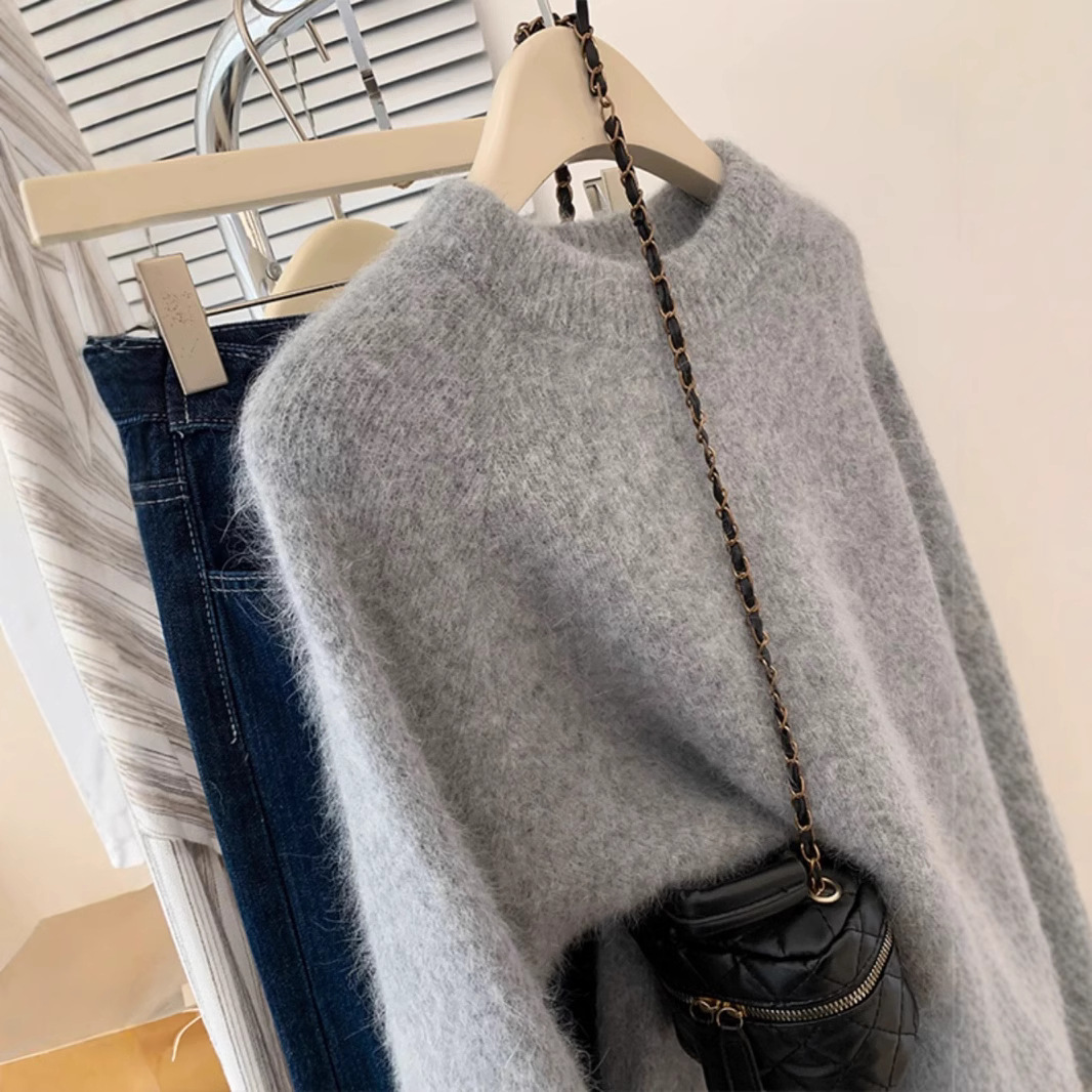 ヨーロッパの商品100純ウールのセーターの女性2025年の冬のピンクの肩のカシミヤはゆったりとしています。