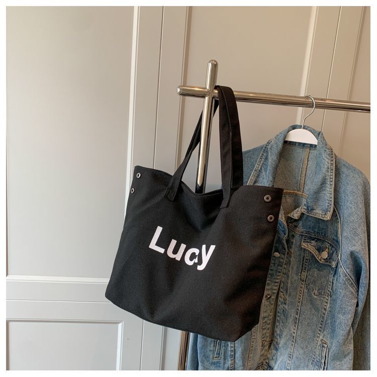 2023 nuevo estilo coreano clásico letras simple bolso de hombro estilo académico bolso casual de gran capacidad