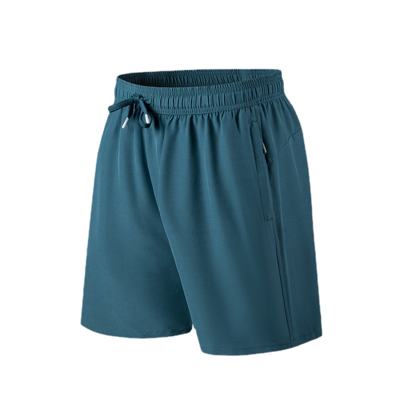 2023 nuevos pantalones cortos para hombres secos rápidos sueltos cinco pantalones casuales deportivos delgados transfronterizos fábrica de pantalones de playa de seda