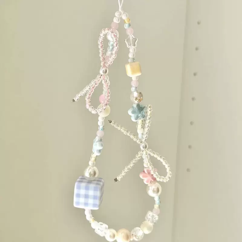 Brand mobile phone with bow, camera, strap, pendant, flowered