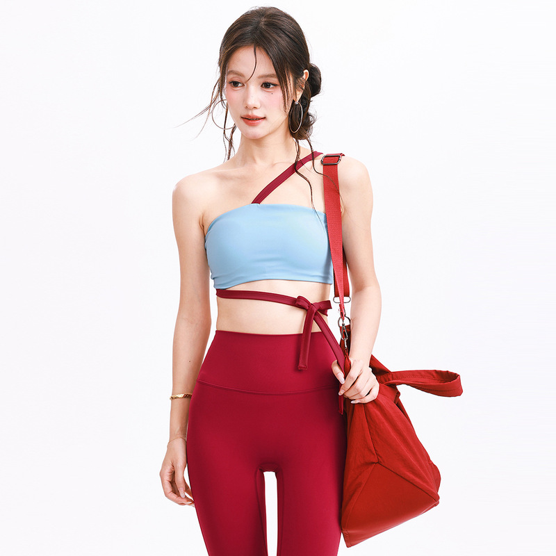 Run Kaka Sports Bra with Chest Pad for Women, Designed with Straps for Pilates, Fitness, and Yoga, Featuring an Asymmetrical Shoulder Strap