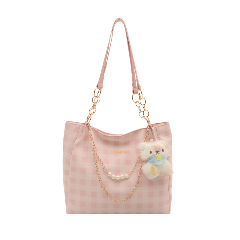Bolsa de alto valor reticular para mujeres 2026 primavera y verano nuevo paquete de viaje de hombro universal bolso de nicho en línea bolsa de mujer