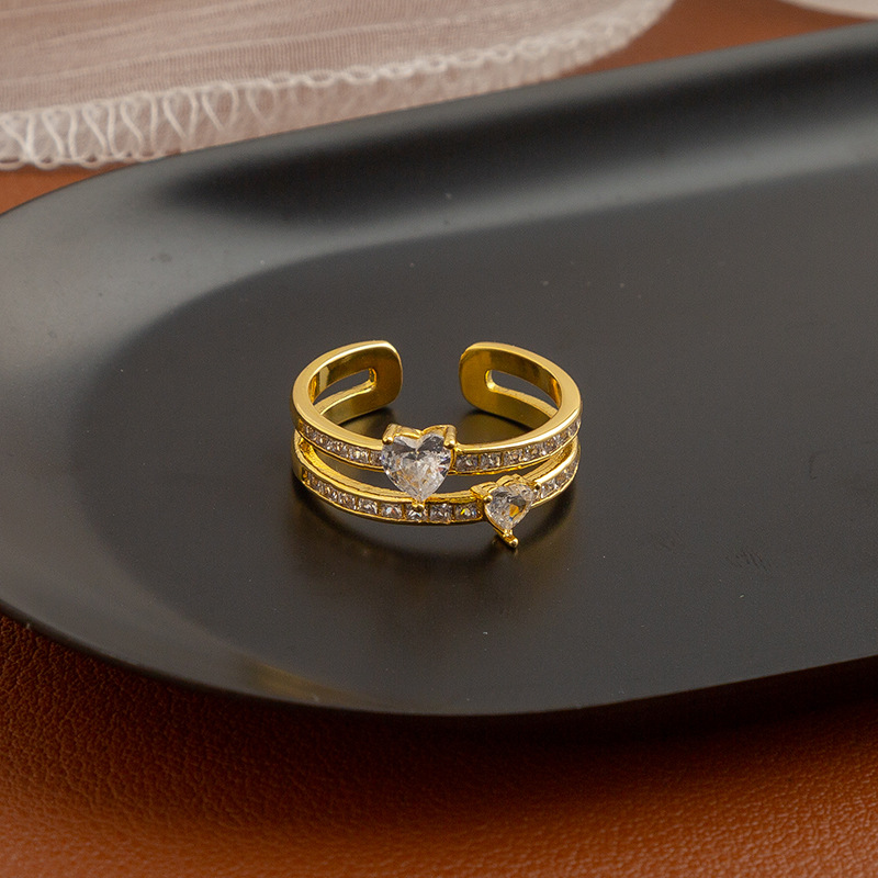 Golden ring with stone with zircon